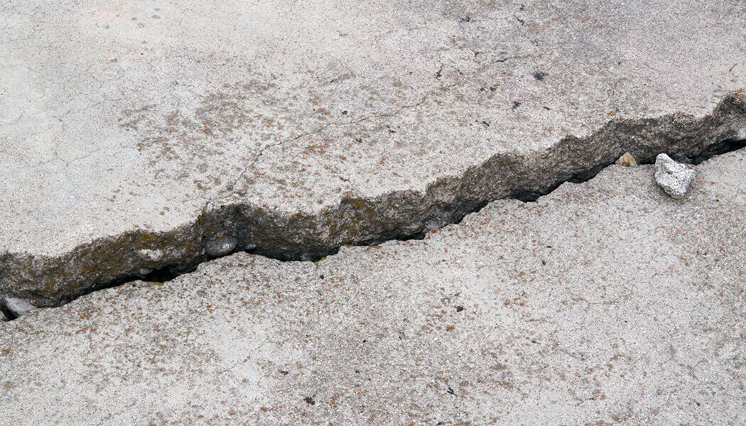 Close up of damaged foundation floor.